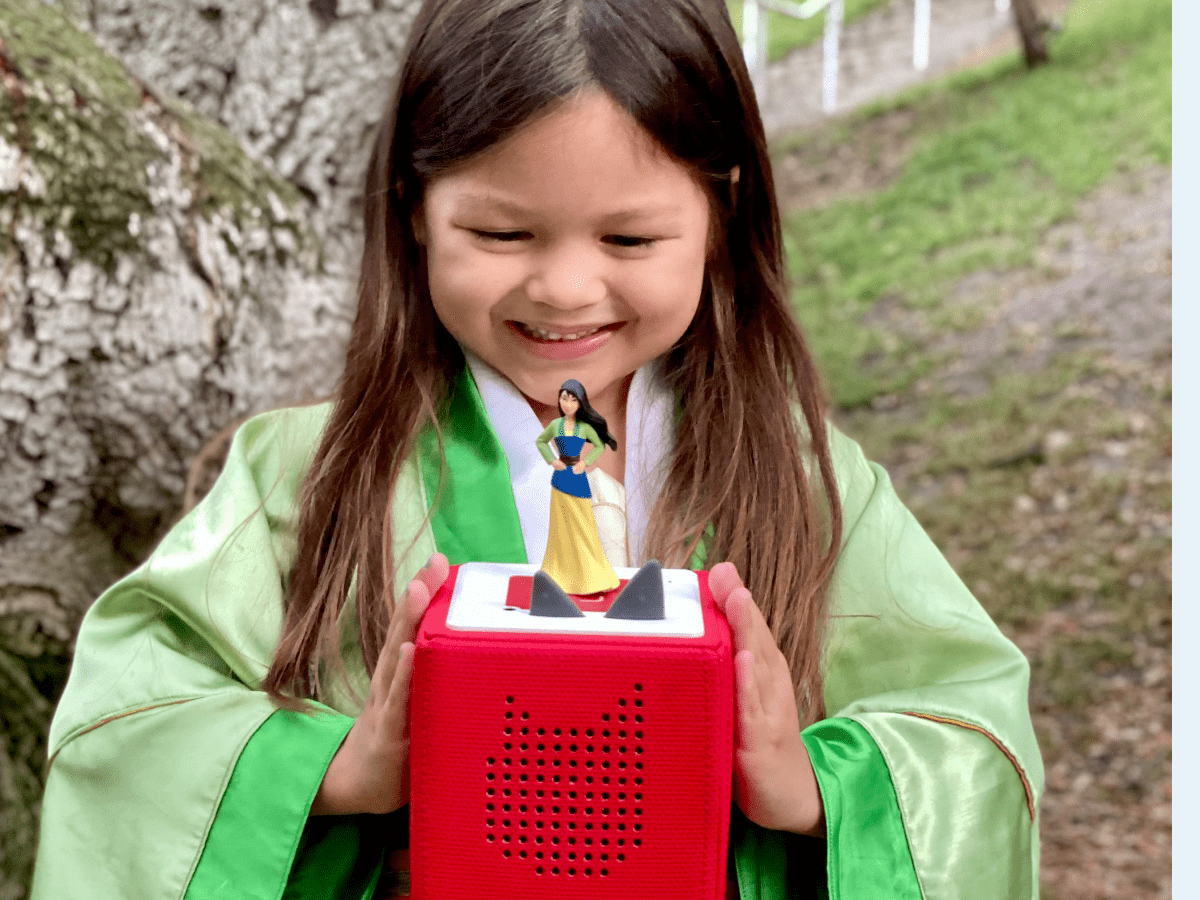 Child Playing With Disney Mulan Tonie