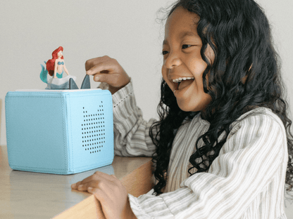 Child Playing With Disney The Little Mermaid Tonie
