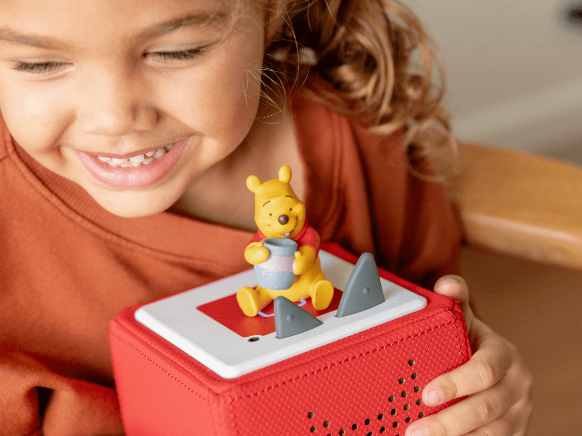 Child Playing With Disney Winnie The Pooh Tonie